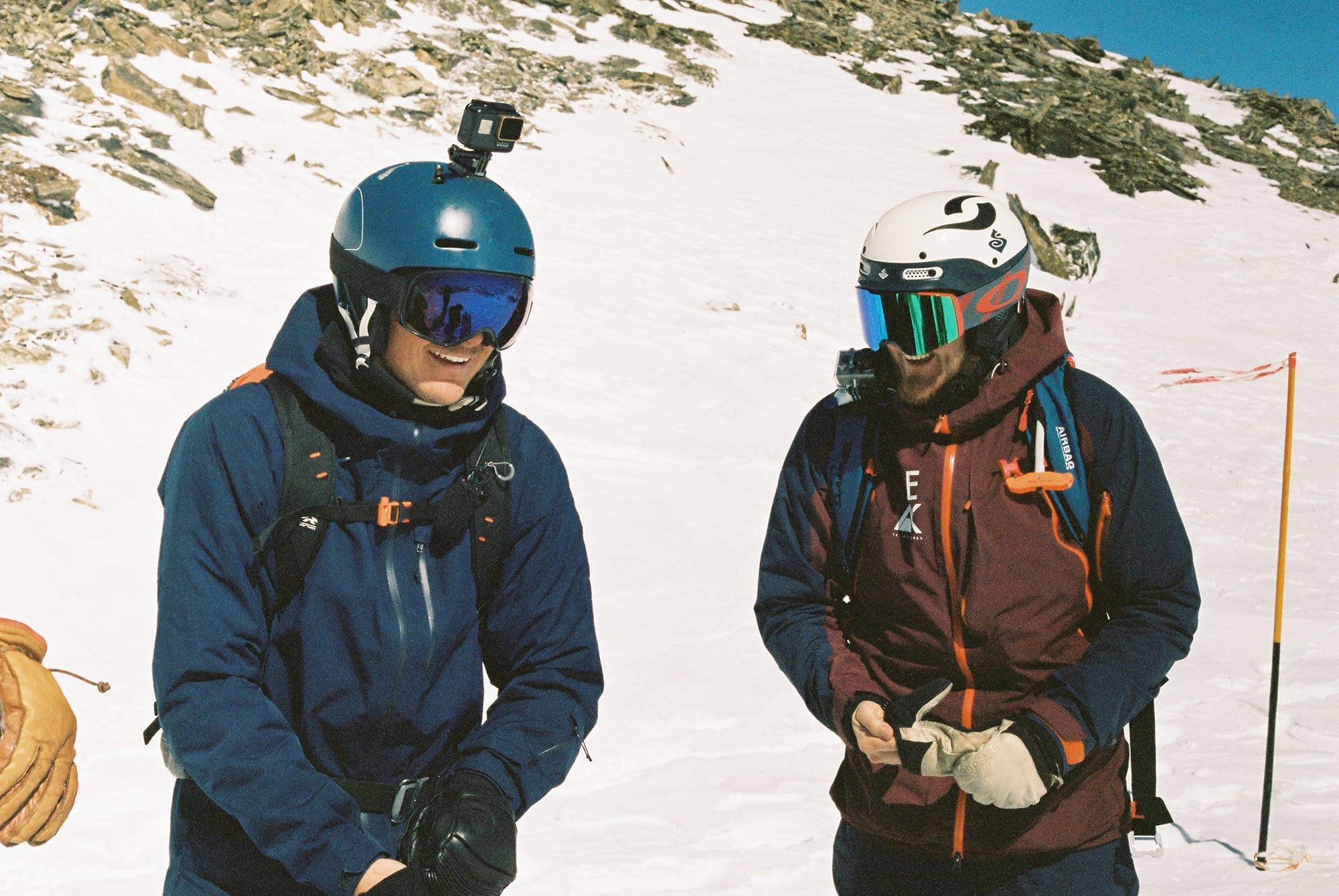 two skiers enjoying an afternoon with peak ski adventures