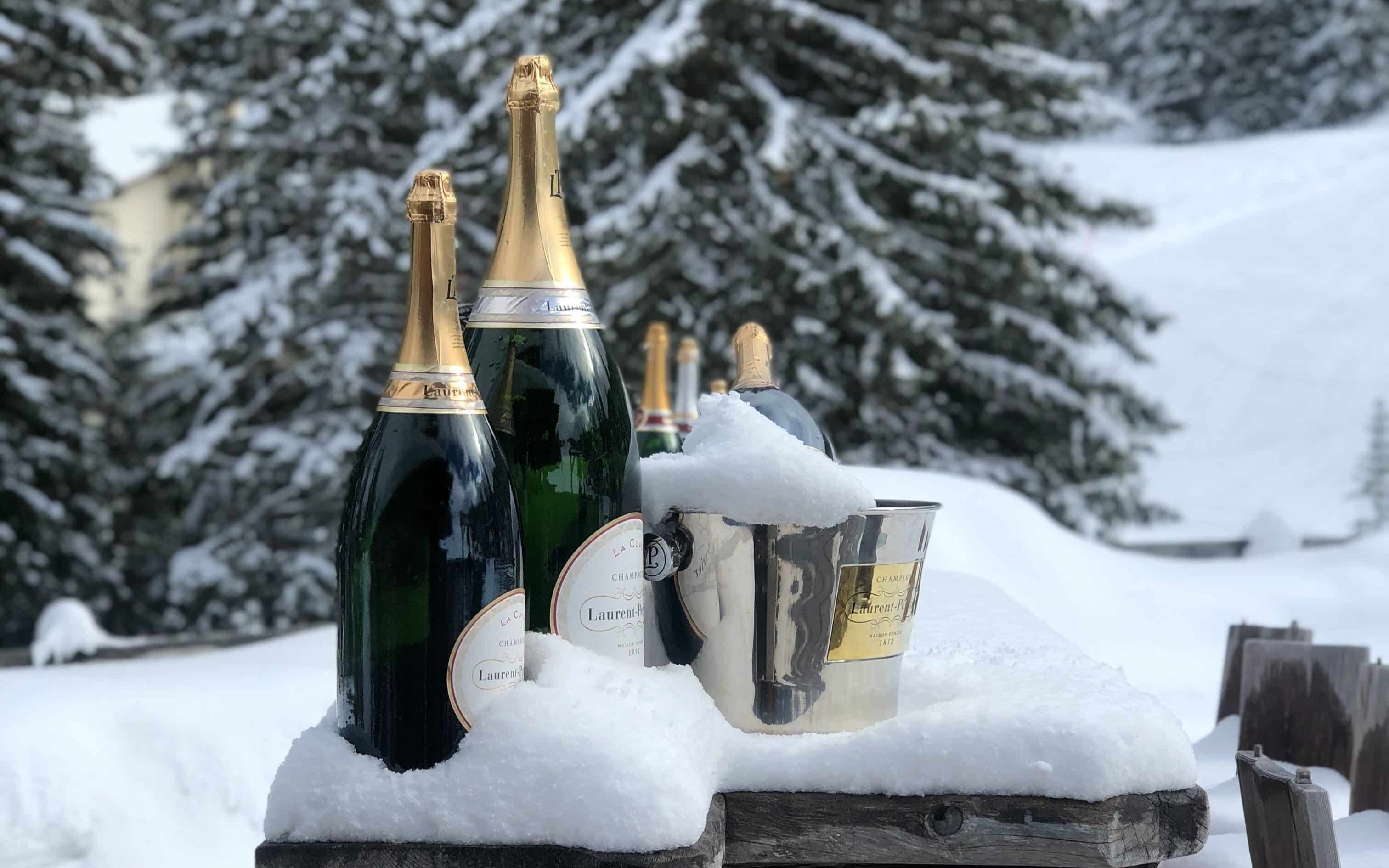 celebrations with champagne in the snow in courchevel